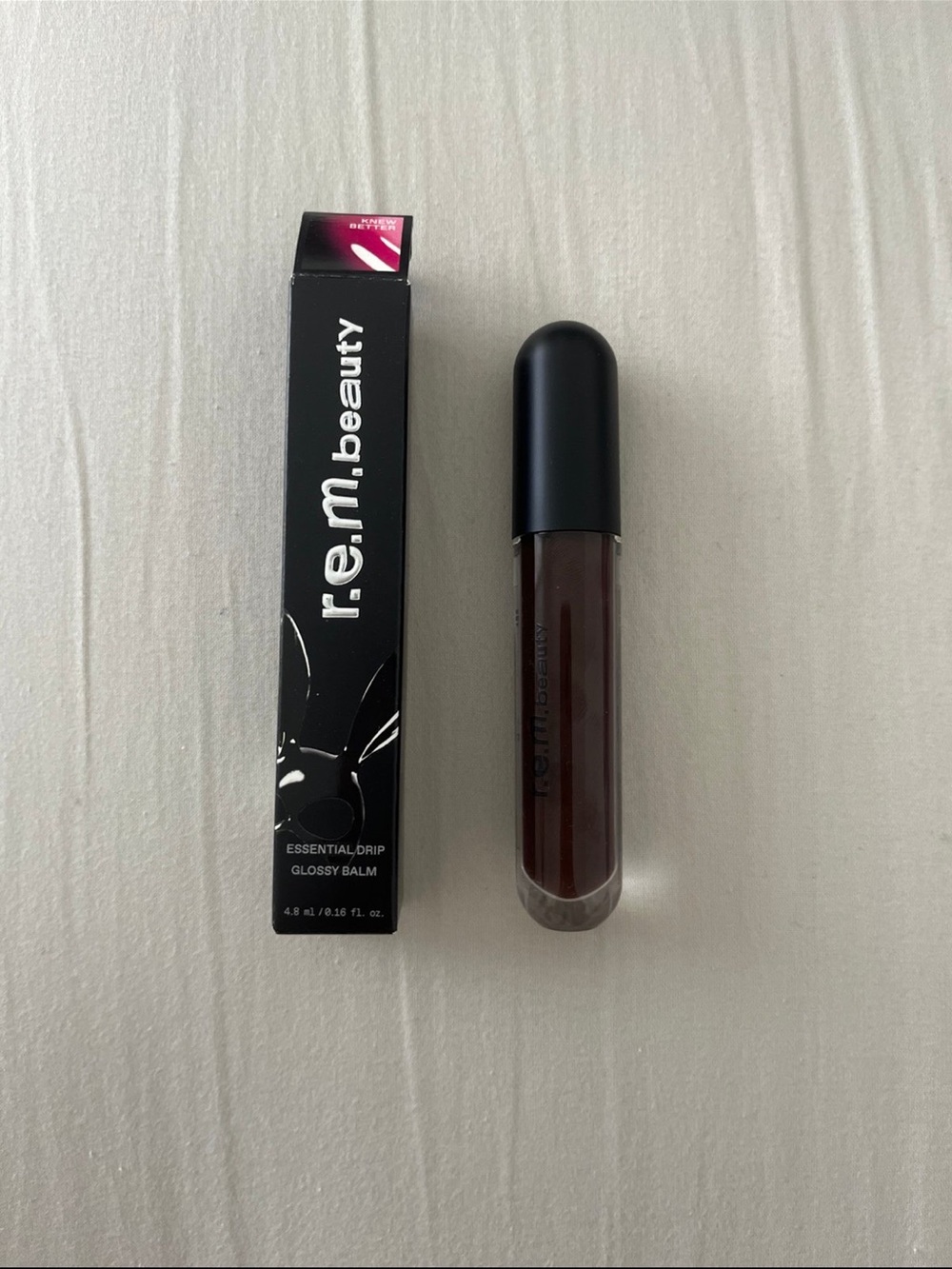 R.e.m Beauty by Ariana Grande Essential Drip Glossy Balm - Knew Better